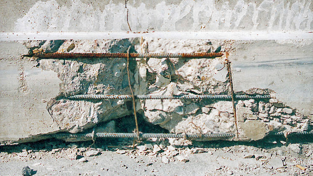 Fendage, division en parties d'une poutre en béton armé